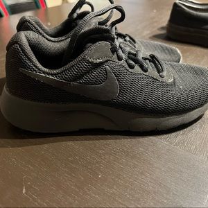 Kids size 3 all black Nike tennis shoes